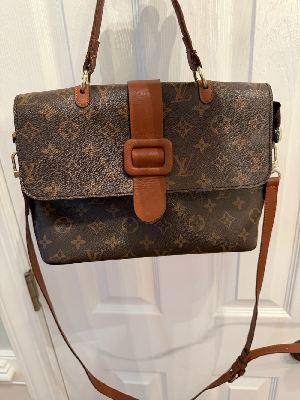 Monogram Canvas Purse with tan leather trim. Very Good Condition!